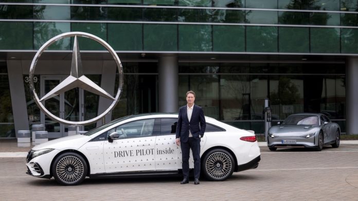 Mercedes CEO Ola Kallenius with Drive Pilot car