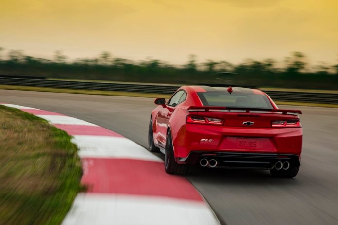 2023 Chevrolet Camaro ZL1 red driving rear REL