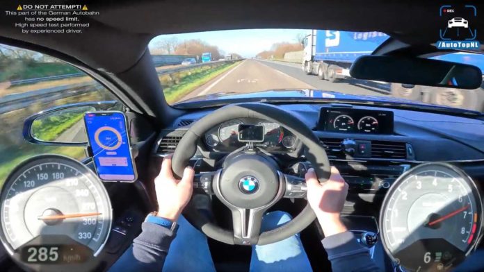 Watch BMW M4 CS Blast Down Autobahn, Fly By Traffic At Top Speed