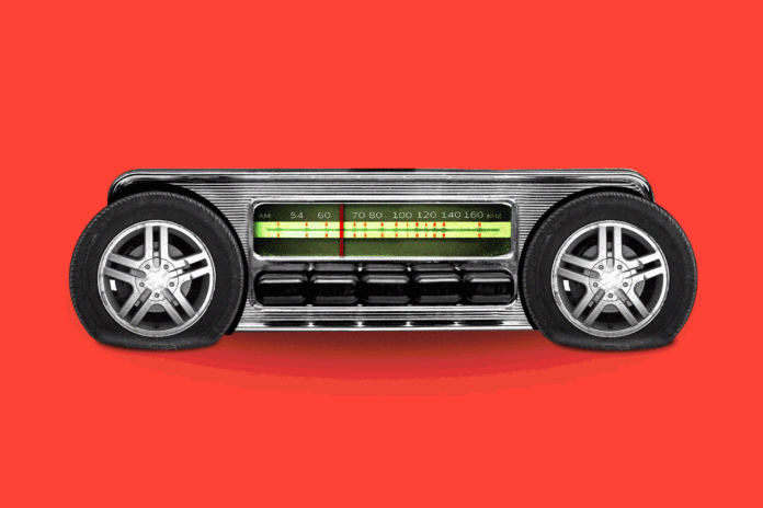 AM radio served the country for 100 years. Will electric vehicles silence it?