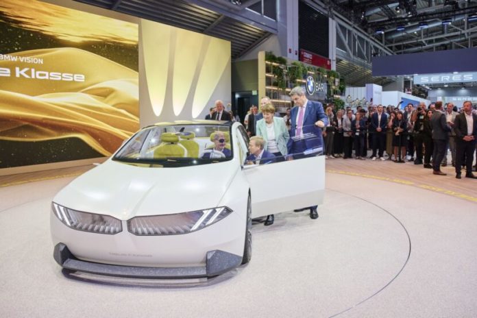 German Chancellor Olaf Scholz Tests the BMW Panoramic Vision Display