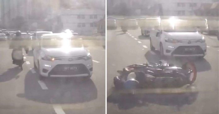 Motorcyclist kicks merging Toyota Vios, then crashes - paultan.org