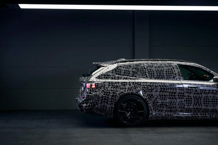 A Closer Look At The BMW M5 Touring G99 Wrapped As Christmas Present