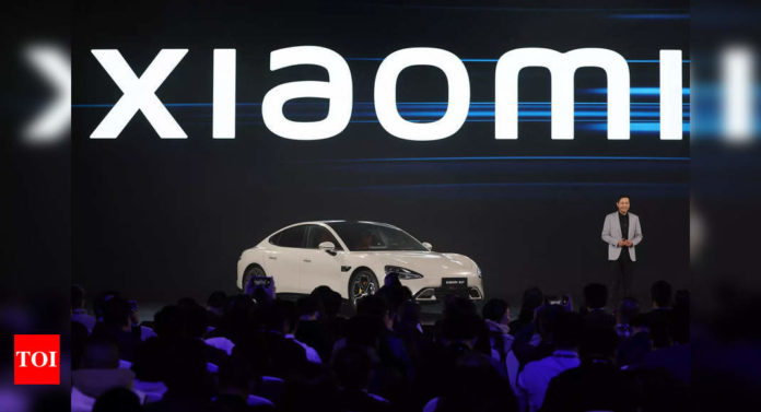 Xiaomi's first electric car claims to have 'better' tech than Tesla - Times of India