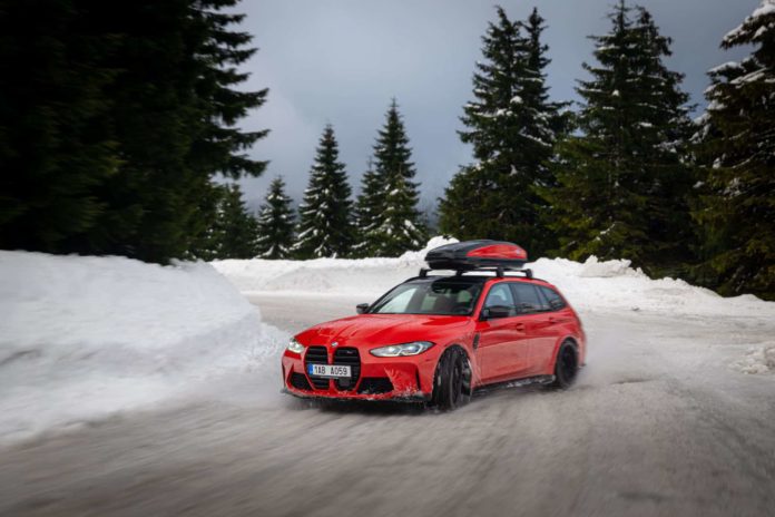 BMW M3 Touring With Roof Box Drifting in the Snow