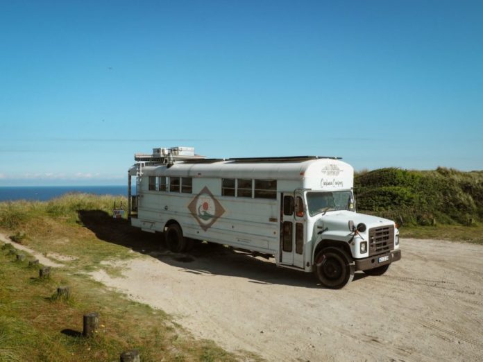 Bluebird International school bus turned into vintage house on wheels