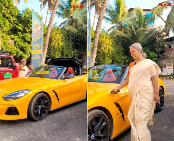 Radhamani with BMW Z4