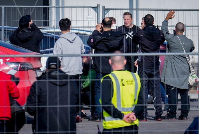 Elon Musk visits a Tesla plant near Berlin as production resumes after a suspected arson attack