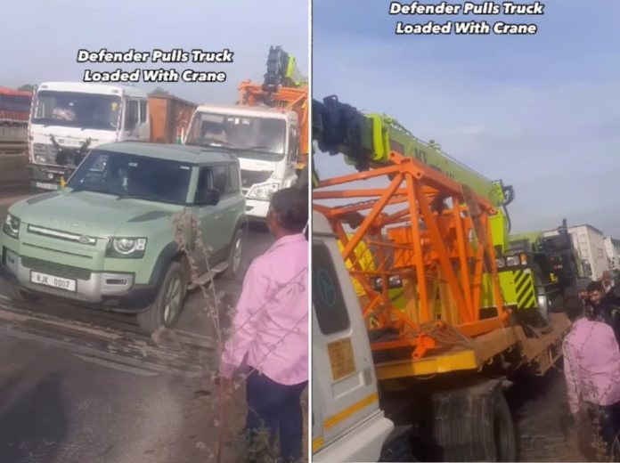 Defender pulls truck & crane