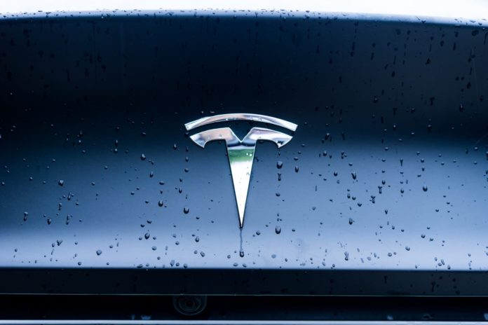 Tesla abandons plans to produce inexpensive electric car - Reuters