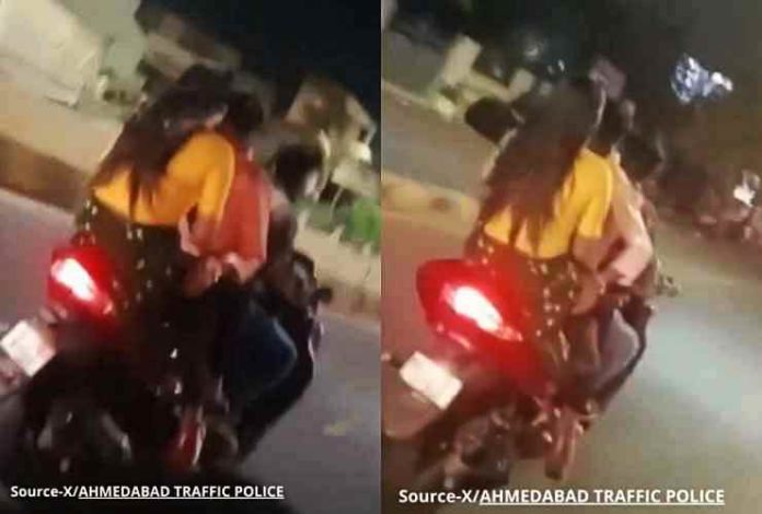 couple romancing on scooter