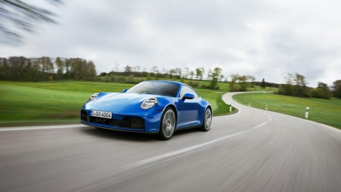 Porche unveils new hybrid sports car