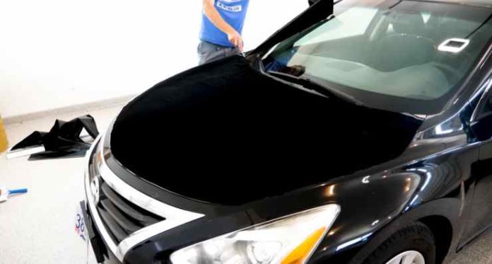 wrapping worlds blackest color on a car