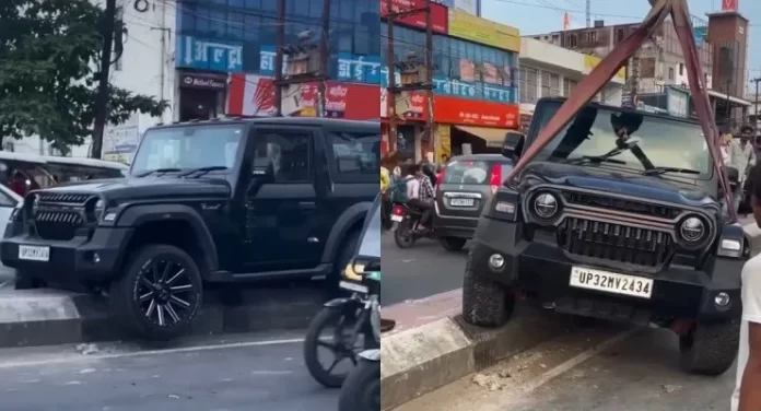 Mahindra Thar stuck on divider